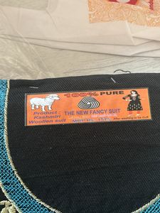 Unstitched Woolen Embroidered Suit Material