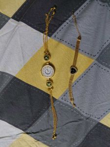 Elegant Gold Chain Watch with Charm Bracelet