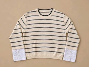 CREAM KNIT STRIPED SWEATER.