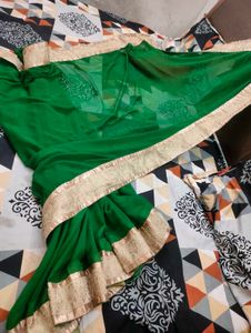 Elegant Emerald Green Saree with Gold Border