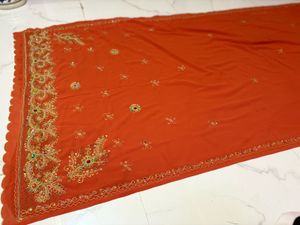 Embroidered rust  Orange Saree