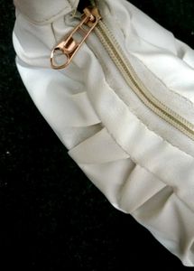 Stylish Cream Handbag with Gold Zipper