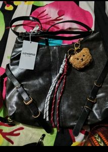 adjustable buckle shoulder bag