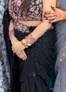 Elegant Black Saree with Floral Blouse