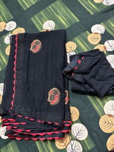 Elegant Black Saree with Peacock Embroidery