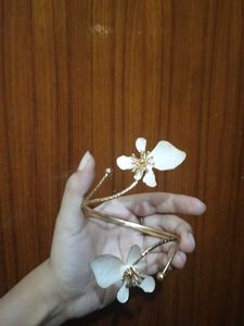 Elegant Armlet with White Flower Design