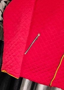 Red Jacket With Golden Chain .