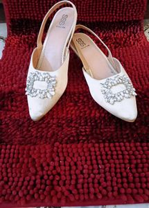 5. Elegant Embellished Slingback Heels