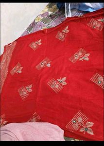 Red chiffon zari saree with stitched blouse