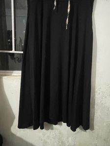 Elegant Black Dress with Printed Sleeves