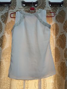 Elegant White Sleeveless Blouse