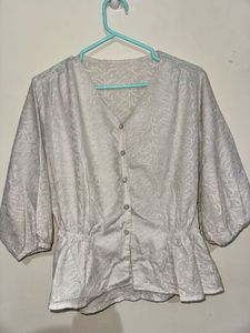 Elegant White Embroidered Peplum Top