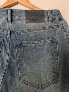 Distressed Blue Denim Jeans