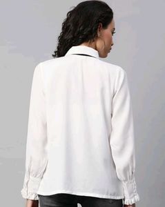 Chic White Ruffled Blouse with Black Bow 🤍