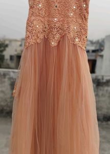 Peach Embroidered Net Lehenga Choli