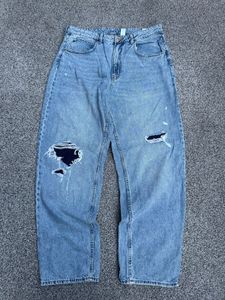 Light Wash Ripped Wide Leg Jeans