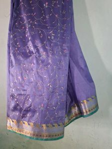 Elegant Purple Saree with Golden Border