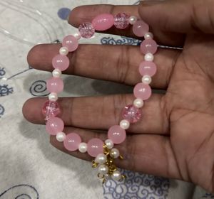 Charming Pink Beaded Bracelet with Charms