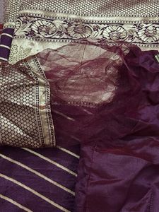 Elegant Purple Saree with Gold Stripes