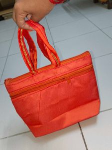 Orange Floral Pouch