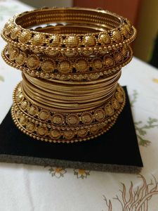 Peacock jhumka with golden bangles