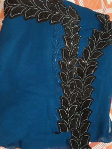 Elegant Teal Saree with Black Embellishments