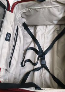 Maroon Hard Shell Luggage Handel grip is broken
