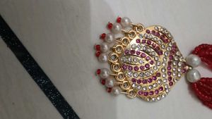 Exquisite Red Beaded Necklace with Embellished Pen