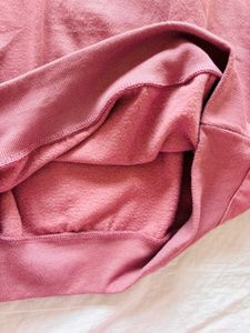 pink sweatshirt