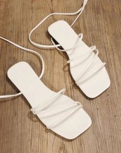 Stylish White Lace-Up Gladiator Sandals