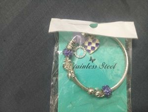 Charming Charm Bracelet with Purple Accents