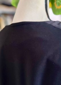 Chic Black Dress with Sheer Sleeves
