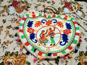 Embroidered Clutch Bag with Tassels