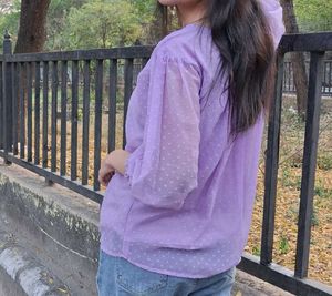 women dark levender color top with dobby print
