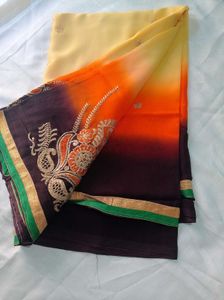 Elegant Cream &amp; Orange Embroidered Saree