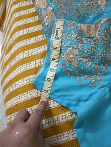 Turquoise Saree with Gold Embellishments