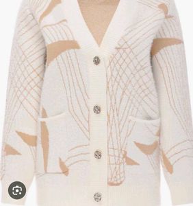 Cozy Cream Cardigan with Unique Pattern