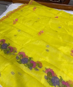 Vibrant Yellow Saree with Floral Motifs