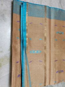 Elegant Tan Saree with Blue Border
