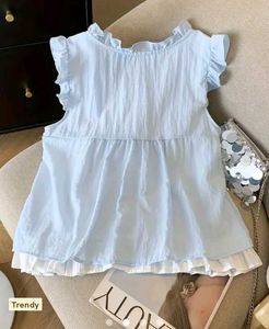 Light Blue Ruffle Blouse