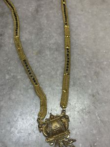 Elegant Golden color Mangalsutra with Black Beads
