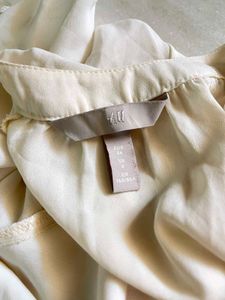 Cream V-Neck Flutter Sleeve Top