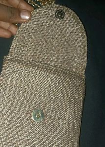 Elegant Golden Beaded Clutch