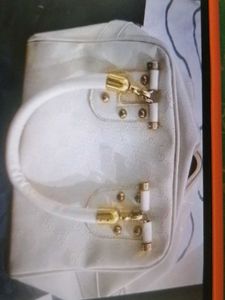 Chic Cream Patent Leather Handbag