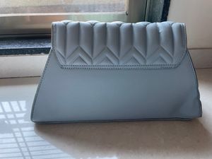 Handbag Or Slingbag