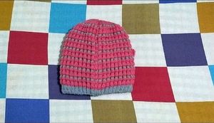 IT IS A WOOLEN WOMEN'S PINK COLOR TOPI.....