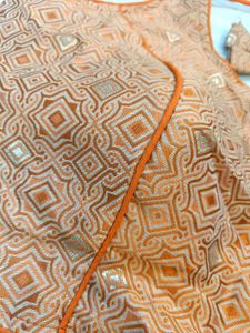 Sleeveless Orange Blouse