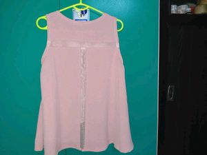Stylish Pink Sleeveless Top with Eyelet Detail