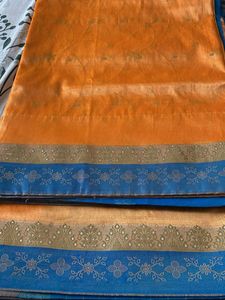 Elegant Orange Saree with Blue Border