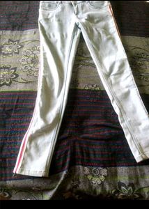 White Jeans and Embroidered Shirt
